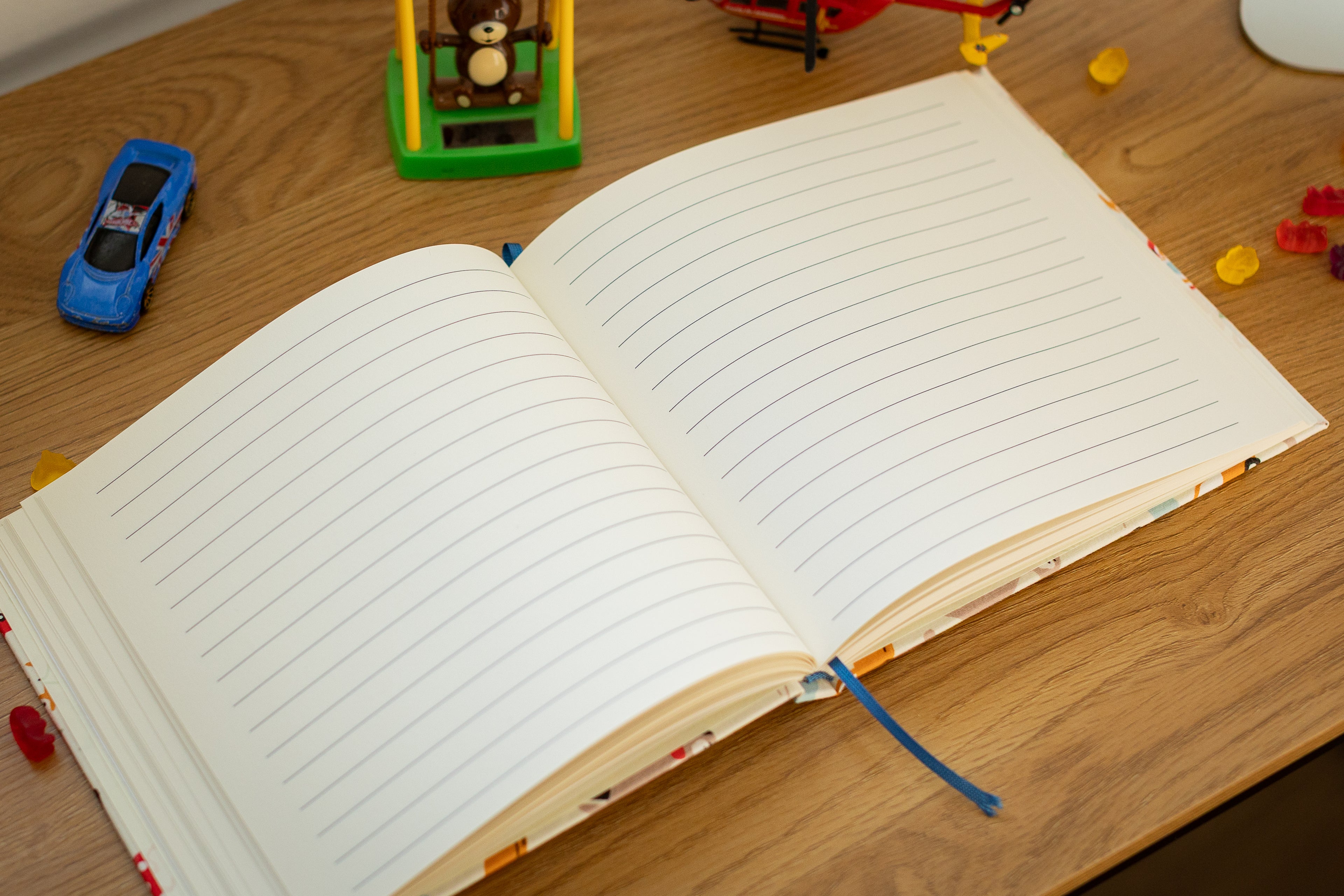 Handgebundenes Notiz-/Malbuch mit Spielzeugmuster